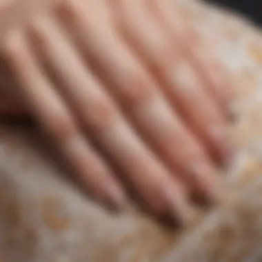 Artistic Expression: Intricate Designs on Short Almond Nails A close-up of vibrant short almond gel X nails with intricate nail art