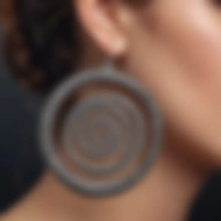 Close-up view of titanium spiral earrings showcasing intricate design